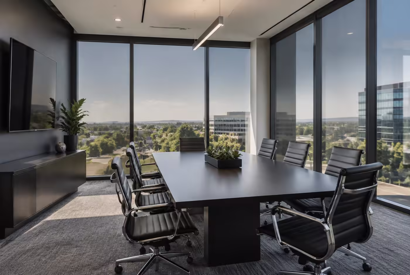 Modern conference room with glare-reducing commercial window film